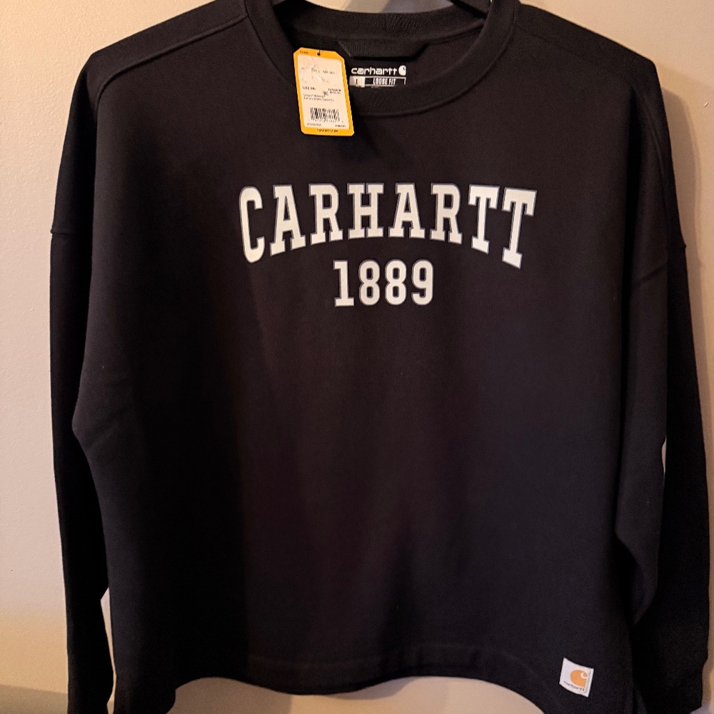 Women’s Carhartt Black w/ light gray letters loose fit sweatshirt. Size large
